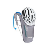CamelBak Classic hydration pack with Giro helmet, ideal for mountain biking adventures