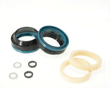 Bike suspension seal kit with black, blue, and beige rings for maintenance and repair