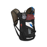 Black CamelBak Chase hydration pack with gear, ideal for mountain biking and trail rides