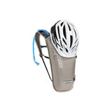 CamelBak Classic hydration pack with Giro helmet, ideal for mountain biking adventures