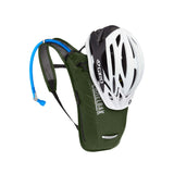 CamelBak HydroBak hydration pack with Giro helmet, ideal for mountain biking adventures.