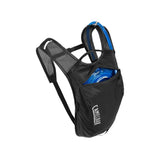 Black CamelBak hydration pack with blue reservoir, ideal for mountain biking and trail rides