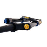 OHINS mountain bike suspension fork with blue and gold adjustment knobs