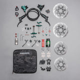SRAM brake kit with rotors, levers, tools, and brake oil for mountain bike maintenance