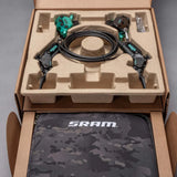 SRAM MAVEN bike brake kit with green calipers and black cables in custom packaging