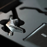Close-up of a TRP brake component nestled in a black protective foam insert.