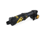 Black and yellow mountain bike shock absorber with adjustment knobs