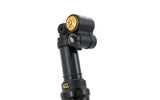 Black and gold mountain bike suspension fork with adjustment dials