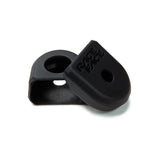 Race Face black bike component caps with embossed branding, ideal for mountain biking accessories