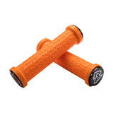Orange Race Face bike grips with textured design and black end caps for mountain biking