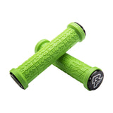 Bright green Race Face bike grips with textured pattern and black end caps