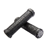 Black Race Face bike grips with textured design and logo end caps